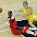 Australia's Rachel Jarry, right, and United States' Lindsay Whalen go for a loose ball during the Olympics.
