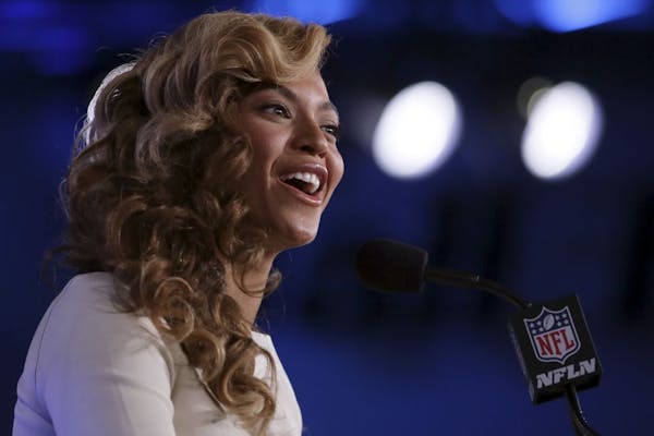 Beyonce sings national anthem at her news conference