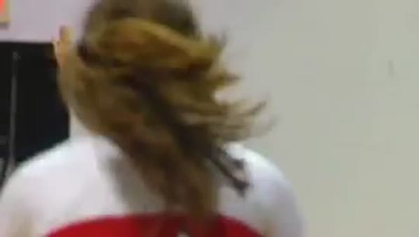 Cheerleader makes unreal half-court shot