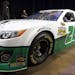 The car Michael Waltrip will drive in the Daytona 500 auto race is displayed during NASCAR media day at Daytona International Speedway, Thursday, Feb.