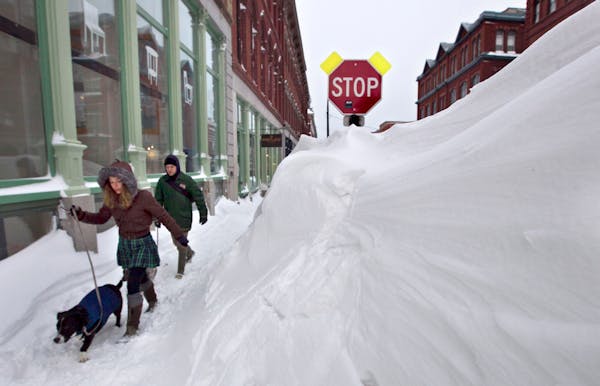 New England begins to dig out after epic snow