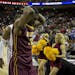 Trevor Mbakwe walks off the court after the Gophers' loss to Florida in the third round of the NCAA Men's Basketball Tournament held at the Frank Erwi