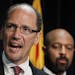 FILE - In this Thursday, May 10, 2012 file photo, United States Assistant Attorney General Thomas Perez, left, who heads up the civil rights division 