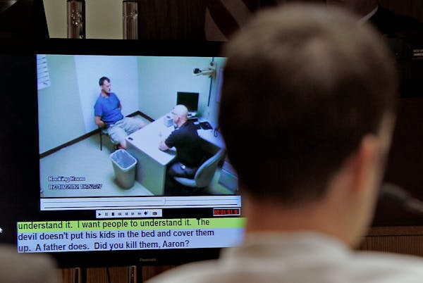Aaron Schaffhausen and jurors watched a video as River Falls Police Detective Charles Golden did the initial interrogation during the second day of tr