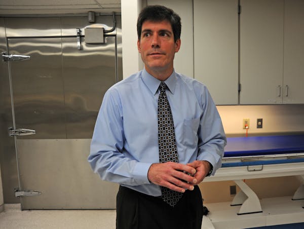Dr. Andrew Baker, Hennepin County's medical examiner, shown in 2012.