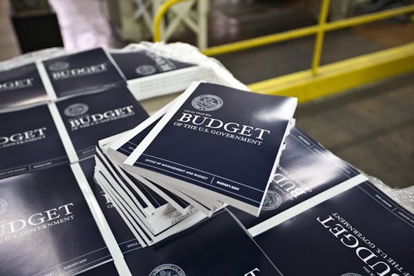 Copies of President Barack Obama's proposed budget plan for fiscal year 2014 are prepared for delivery at the U.S. Government Printing Office in Washi