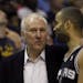 Spurs coach Gregg Popovich, left, talked to guard Tony Parker during a timeout in the first half of Game 4 of the Western Conference finals on Monday.