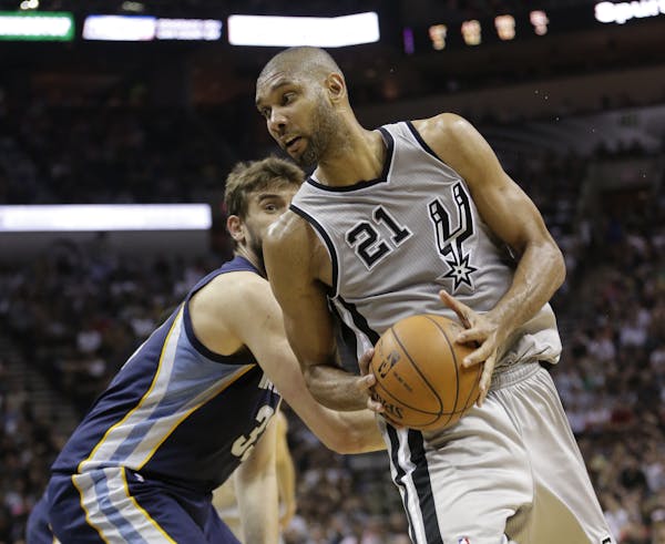 Spurs survive in overtime