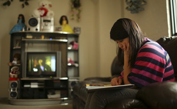 Jackie Ponce Chacon, a sixth-grader at Andersen United School in Minneapolis, reads for half an hour at home every day after school, then talks about 