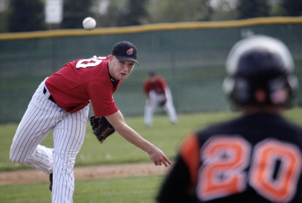 Centennial High's Chris Anderson delivers a pitch against Osseo in 2010