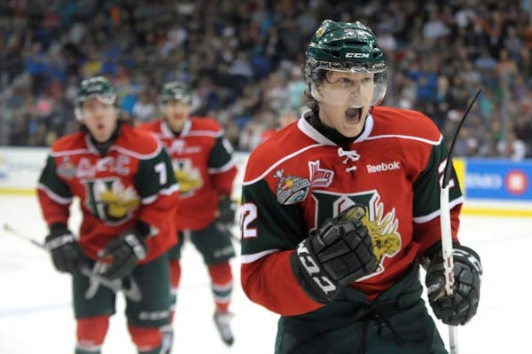 Halifax Mooseheads centre Nathan MacKinnon celebrates a goal against the Portland Winterhawks during the third period of Memorial Cup final action in 