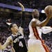 Dwyane Wade shoots against Danny Green during the second half of Game 6 of the NBA Finals