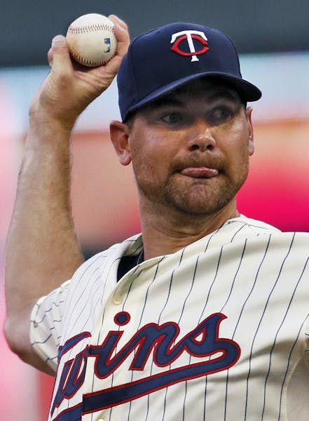 Twins starter Mike Pelfrey strained his back and went on the 15-day disabled list.