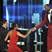 LeBron James, right, presents the Arthur Ashe courage award to Robin Roberts, center, at the ESPY Awards on Wednesday, July 17, 2013, at Nokia Theater
