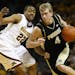 Robbie Hummel (right) against the Gophers