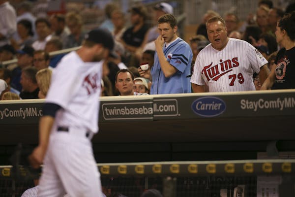 Twins reliever Jared Burton left the field displeased with his performance — and the feeling among Target Field fans appeared to be mutual — after