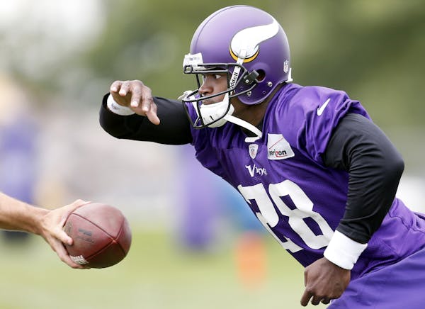 Vikings running back Adrian Peterson took a handoff during Saturday afternoon's training camp practice in Mankato.