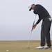 Adam Scott putted on the 11th green during the final round of the British Open. For the second year in a row, Scott couldn't hold on to a final-round 