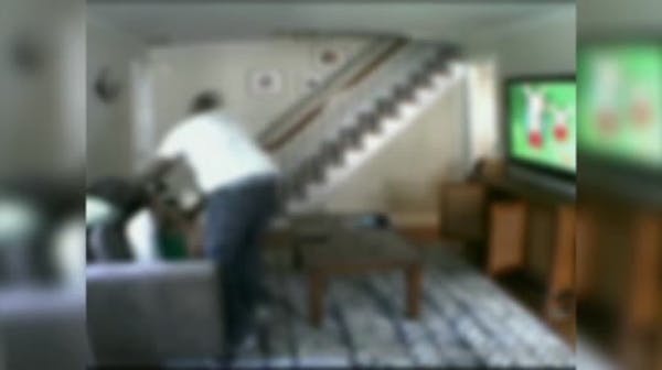Nanny cam shows intruder beating woman