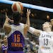 Minnesota Lynx guard Lindsay Whalen (13) tries to grab a rebound against Phoenix Mercury guard Briana Gilbreath (15) in the first half of a WNBA baske