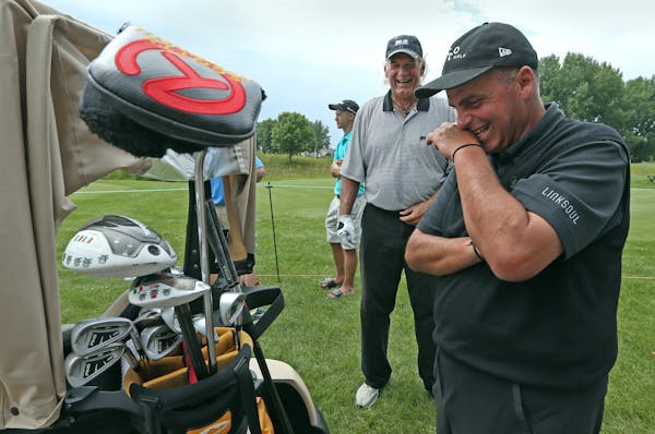 Rocco Mediate, right, and former Minnesota Gov. Jesse Ventura shared a joke Wednesday during the 3M Championship pro-am. Mediate said his tips could e