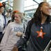Seimone Augustus, who has been a Lynx the longest — since 2006 — carried the WNBA championship trophy off the airplane. Her smile said it all abou