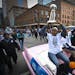 Lynx player Maya Moore held up the championship trophy as she rode a float with Seimone Augustus during a championship celebration parade for the WNBA
