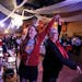 Jeanne Stuart left and Carla Kjellberg volunteers fro Betsy Hodges danced at El Nuevo Rodeo, the campaign headquarters of Minneapolis mayoral candidat