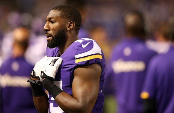 Vikings wide receiver Greg Jennings walked along the sideline with the team down 44-24 in the fourth quarter against Green Bay.