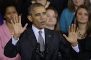 President Barack Obama gestures about the varity of plans available as he addresses supporters on his signature legislation, the Affordable Care Act, 