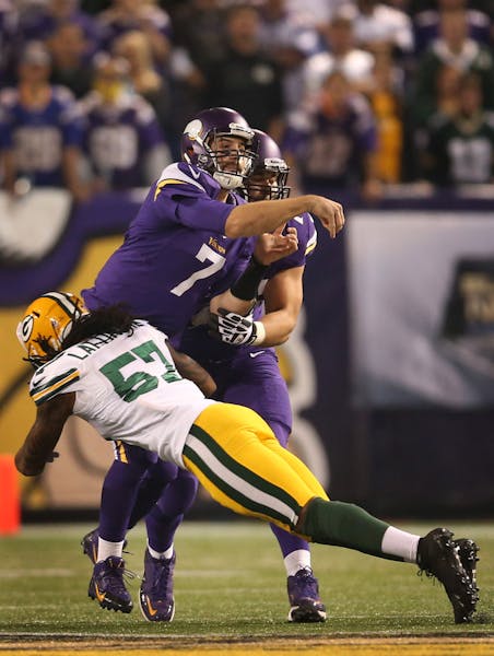 Vikings quarterback Christian Ponder felt the pressure from the Packers on Sunday night. Ponder went 14-for-21 for 145 yards and no TDs.