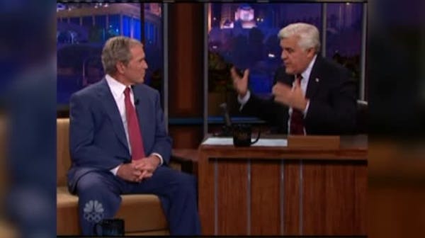 George W. Bush jokes around with Jay Leno