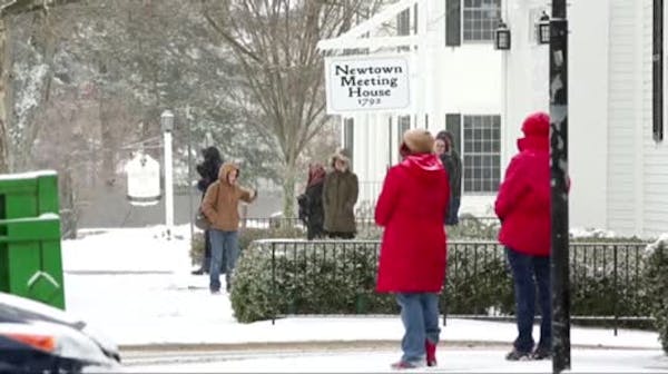 Bells toll in Newtown for 26 victims