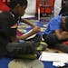 A third-grader still needed a little help coping with his regular class at Hamline Elementary in St. Paul. Last year, the boy spent most of his time i