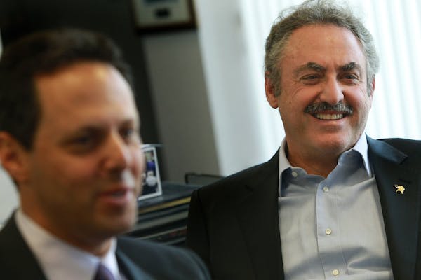 Vikings owners Zygi Wilf, right, and brother Mark Wilf.