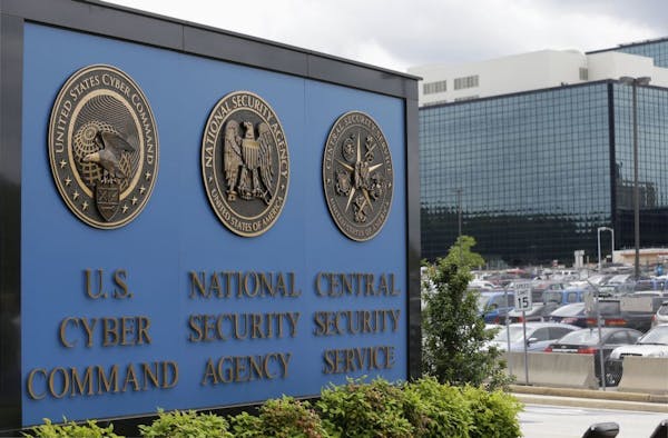 FILE - This June 6, 2013, file photo shows the sign outside the National Security Agency campus in Fort Meade, Md. A presidential advisory panel has r