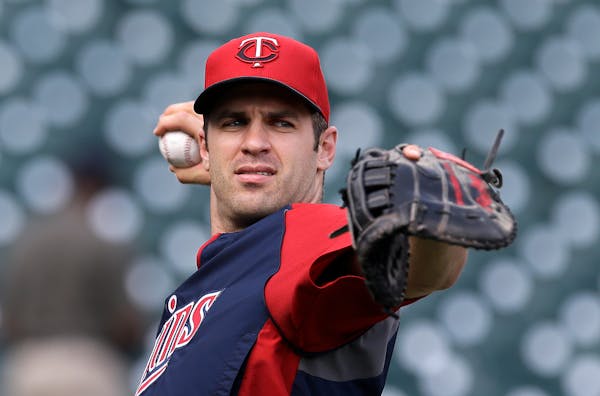 Joe Mauer should get used to wearing that first baseman's glove.