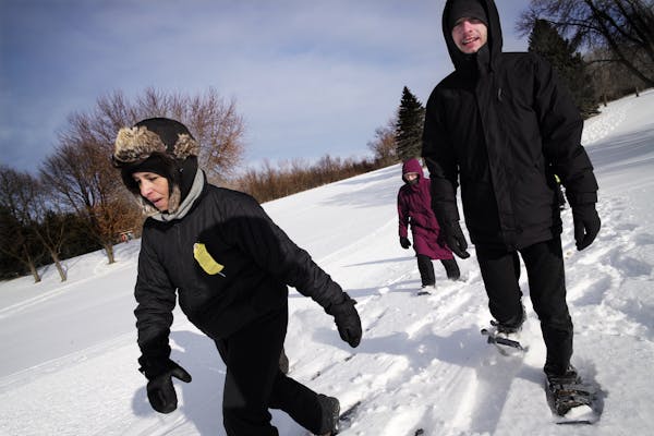 Despite frigid weather Sunday, snowshoe instructor Kim Woodin and volunteer Aaron Crenshaw led a class at Cleary Lake Regional Park in Prior Lake.