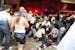 People help an injured man, victim of a fire in a club in Santa Maria city, Rio Grande do Sul state, Brazil, Sunday, Jan. 27, 2013. According to polic