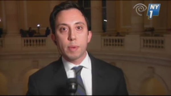 NY congressman threatens to throw reporter off balcony