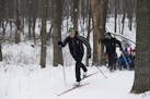 Anna French digs practices with the Wayzata girls cross country ski team Friday afternoon. ](Matthew Hintz, 010414, Wayzata)