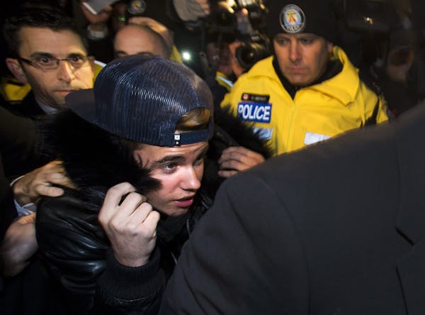 Bieber turns self in to Canadian police