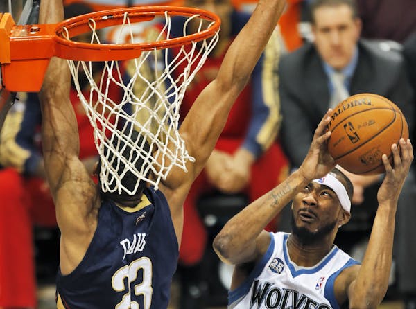 Corey Brewer beat the Pelicans' Anthony Davis to the basket for a first half layup.