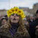 A Ukrainian woman shouts slogans during a demonstration in support of Ukraine's protests against Viktor Yanukovych's government in Madrid, Spain, Sund