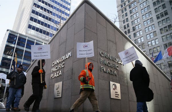 Members of the United Transportation Union picketed at the Canadian Pacific Railway’s U.S. headquarters in Minneapolis about rail safety issues on T