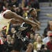 Chicago Bulls center Nazr Mohammed (48) and Minnesota Timberwolves power forward Dante Cunningham (33) compete for the ball during the first half of t