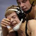 Anthony Kern grimaced as he took a finger to the eye in a match against Brock Buysse from Minneota-Lincoln Hiigh in the 106 weight class in 1A quarter