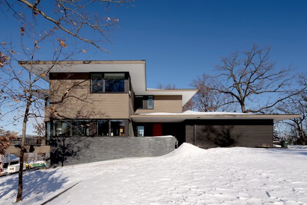 Kyle and Katie Pederson's new contemporary-style home designed by Architect John Dwyer.