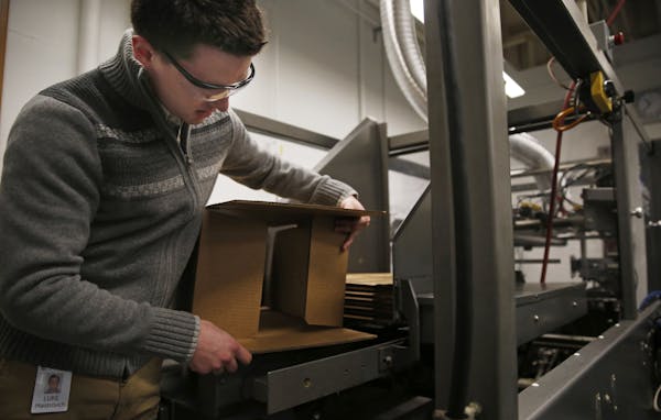 At H.B. Fuller’s research facility in Vadnais Heights, engineer Luke Maistrovich showed how innovative packaging glues improve carton strength and q