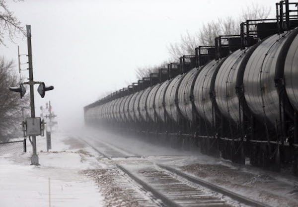 An oil train headed for Minnesota rolled through Casselton, N.D., scene of an explosive rail accident in December.